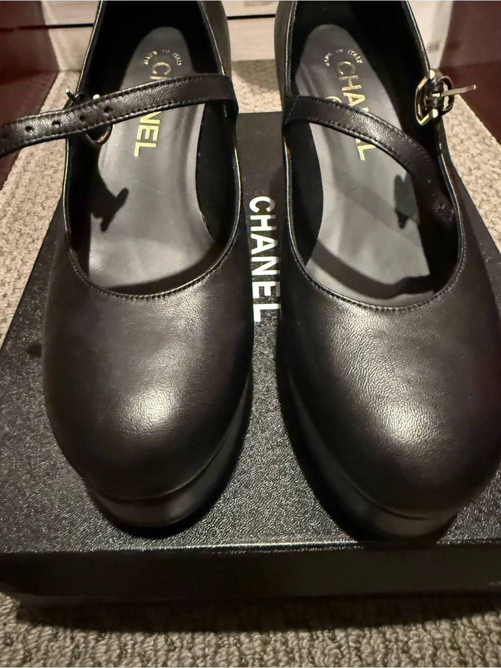 CHANEL Black Platform Mary Jane Pumps with Gold Accent